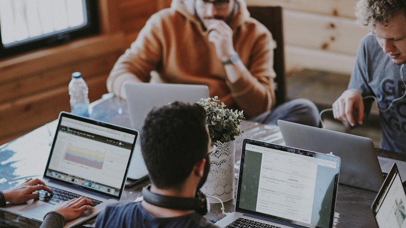 Professional networking event with exhibitors and job seekers in a large hall