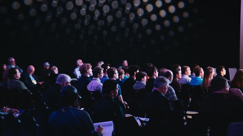 Exhibition hall with education stands and visitors at the RDS